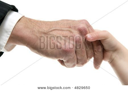 Empresario padre dando la mano a un niño
