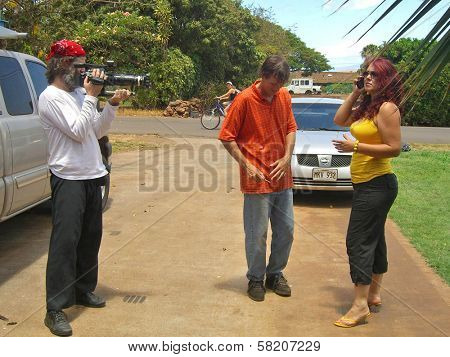 Tom Althouse and Fileena Bahris on the set of 