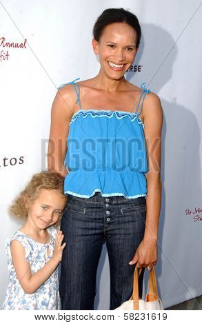 Amanda Luttrell Garrigus and daughter Sophie at the John Varvatos 5th Annual Stuart House Benefit. John Varvatos Boutique, West Hollywood, CA. 03-11-07