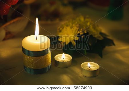 Three Small Candle Of Light. Holiday Romantic Ambience And Decoration