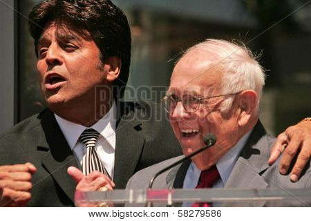 Erik Estrada and Johnny Grant at the cermony honoring Erik Estrada with the 2,336th star on the Hollywood Walk of Fame. Hollywood Boulevard, Hollywood, CA. 4-19-07