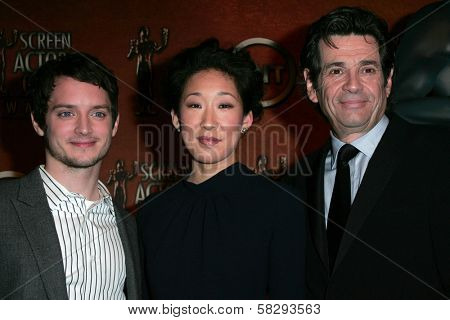 Elijah Wood with Sandra Oh and Alan Rosenberg at the press conference announcing the nominations for the 13th Annual Screen Actors Guild Awards. Pacific Design Center, West Hollywood, CA. 01-04-07