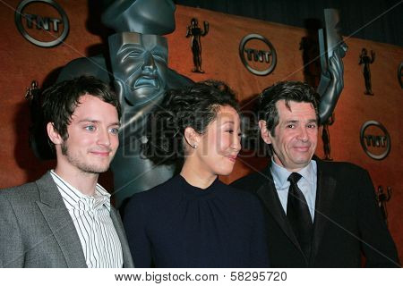 Elijah Wood with Sandra Oh and Alan Rosenberg at the press conference announcing the nominations for the 13th Annual Screen Actors Guild Awards. Pacific Design Center, West Hollywood, CA. 01-04-07