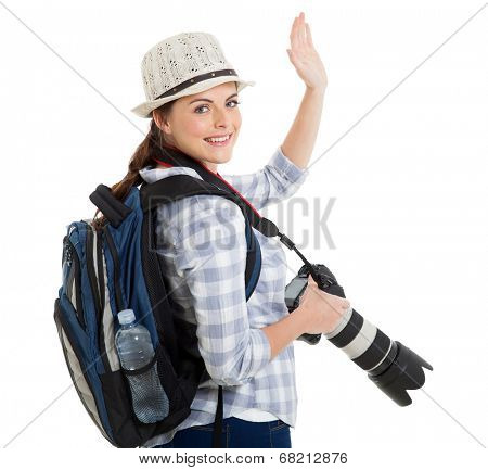 young tourist waving good bye isolated on white