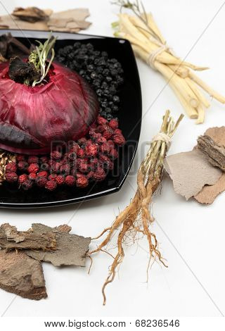 Traditional chinese herbal medicine ingredients with not real hieroglyphs, close-up