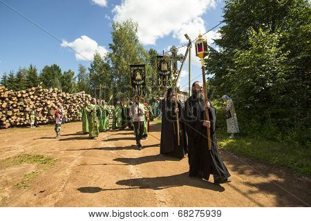 KRASNY BRONEVIK, RUSSIA - JULY 7, 2014: Celebrations commemorating the Rev. Anthony Dymsky (died 1224) in Antony Dymsky Monastery - Procession on Lake Dymsky, the great blessing of water and bathing.