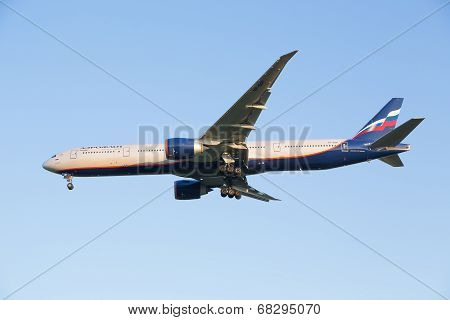 The plane Boing-777-300ER of airline Aeroflot decreases before landing at the Sheremetyevo airport