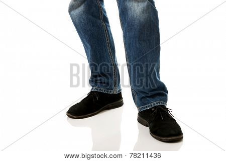 Close up on a man in casual clothes.