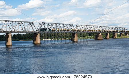 Railroad Bridge In Kyiv Across The Dnieper With Freight Train