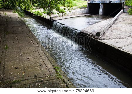 Water Stream Flowing Out The Underground Tunnel