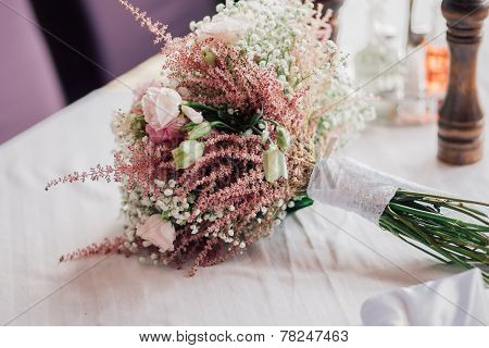 Wedding Boquet On The Table