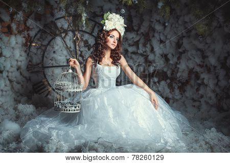 Girl With A Cell In The Winter Forest.