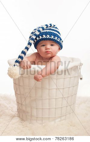 Pouting Baby Boy Wearing A Stocking Cap