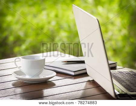 Cup Of Coffee And Laptop