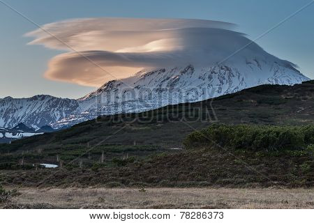 Mountain (volcanic) Landscape: Clouds Over The Volcano At Sunset