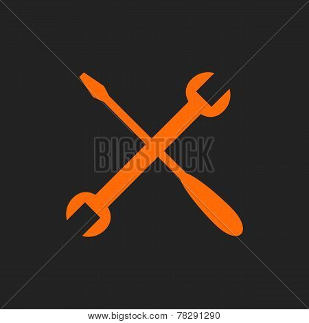Orange crossed tools on black