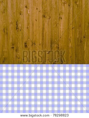 Wooden background with purple tablecloth