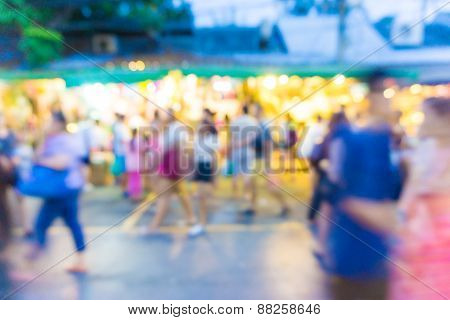 Blur Tourists Walk In Shopping Market