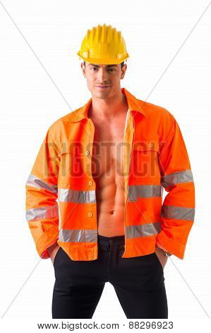 Handsome young construction worker with orange suit open