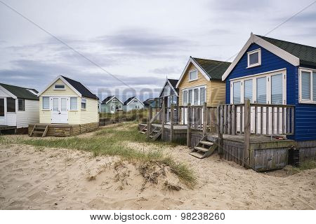 Lovely Beach Huts On Sand Dunes And Beach Landscape