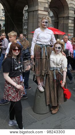 EDINBURGH - AUGUST 8: Members of Fourth Monkey publicize their show Grimm's Tales during Edinburgh Fringe Festival on August 8th, 2015 in Edinburgh, Scotland