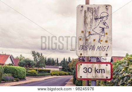Danish Sign With Playing Kids