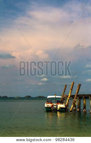 Boat Floating At Pier.