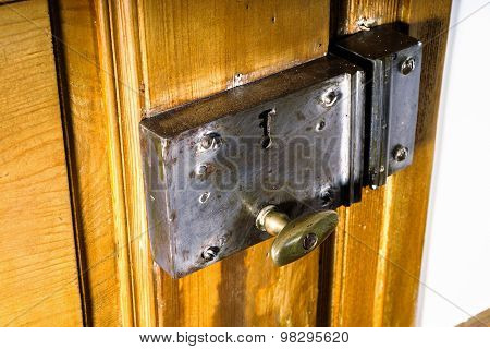 Old Metal Keylock On Retro Wooden Door