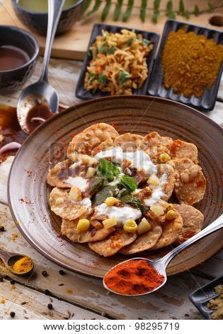 Indian Snack Papri Chaat Served With Yoghurt With Seasoning