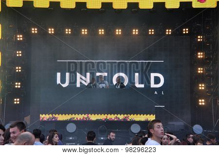 Tehnician Setting The Stage Lights Before A Concert