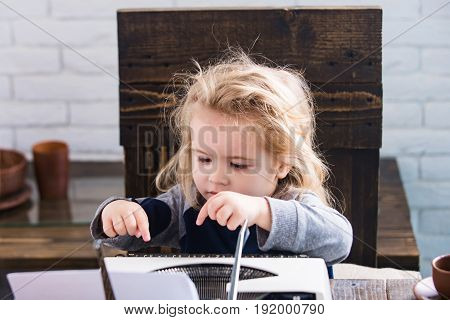 Business Kid Or Small Boy Or Businessman Child With Typewriter