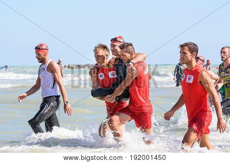 Pescara Italy - June 18 2017: Arrival for the swimming test of disabled athlete Alex Zanardi at Ironman 70.3 Pescara of June 18 2017