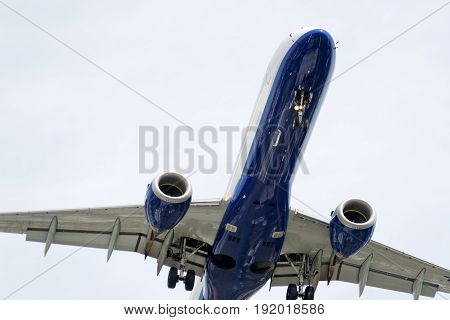 The underside of a modern airplane and its landing gear