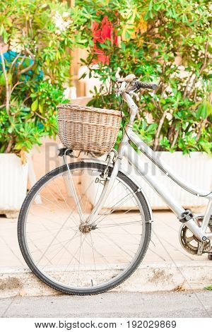 Beautiful vintage bicycle near the house on italian street