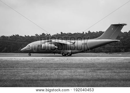 BERLIN GERMANY - JUNE 01 2016: Preparing for takeoff military transport aircraft Antonov An-178. Black and white. Exhibition ILA Berlin Air Show 2016