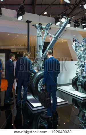 BERLIN GERMANY - JUNE 01 2016: The stand of engineering company Liebherr. Front landing gear of airliners. Exhibition ILA Berlin Air Show 2016.