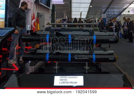 BERLIN GERMANY - JUNE 01 2016: The stand of Roketsan is a major Turkish weapons manufacturer and defense. In the foreground Mizrak-U is a long range air-to-surface anti-tank missile. Exhibition ILA Berlin Air Show 2016.