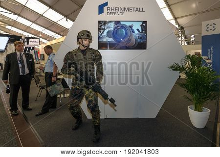 BERLIN GERMANY - JUNE 01 2016: The stand of Rheinmetall Defence. Modern equipment a soldier of the German army (Bundeswehr). Exhibition ILA Berlin Air Show 2016.