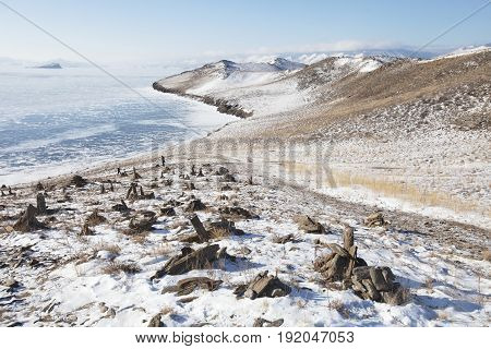 Stone Pyramids On Ogoi Island. Baikal Lake Winter Landscape