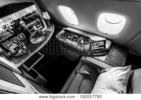BERLIN GERMANY - JUNE 02 2016: Interior of first class of the world's largest aircraft Airbus A380. Emirates Airline. Black and white. Exhibition ILA Berlin Air Show 2016