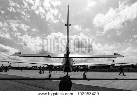 BERLIN GERMANY - JUNE 02 2016: High altitude and reconnaissance aircraft Grob G520 T. Rear view. Black and white. Exhibition ILA Berlin Air Show 2016