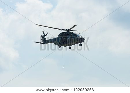 BERLIN GERMANY - JUNE 02 2016: Helicopter NH90 of the German Army. Demonstrative performance. Exhibition ILA Berlin Air Show 2016