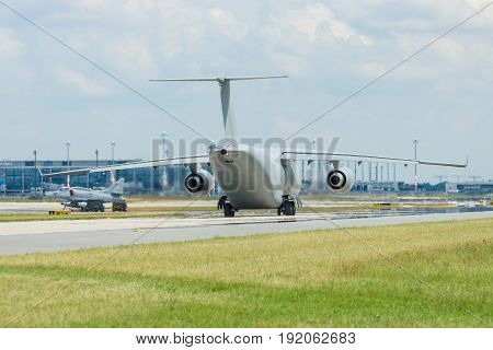 BERLIN GERMANY - JUNE 02 2016: Military transport aircraft Antonov An-178 on the taxiway. Waiting takeoff. Exhibition ILA Berlin Air Show 2016