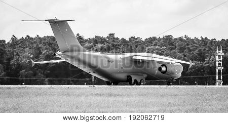 BERLIN GERMANY - JUNE 02 2016: Preparing for takeoff military transport aircraft Antonov An-178. Black and white. Exhibition ILA Berlin Air Show 2016