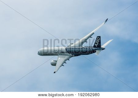 BERLIN GERMANY - JUNE 02 2016: Demonstration flight Airbus A350 XWB. Exhibition ILA Berlin Air Show 2016
