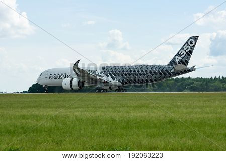 BERLIN GERMANY - JUNE 02 2016: The newest Airbus A350 XWB at the airfield. Exhibition ILA Berlin Air Show 2016