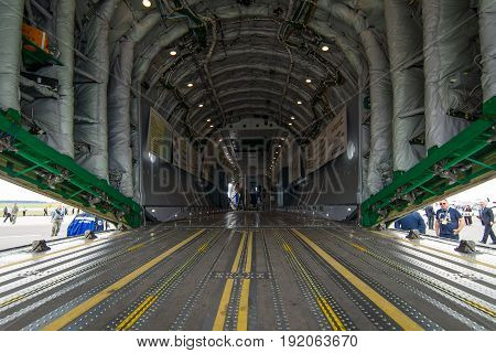 BERLIN GERMANY - JUNE 02 2016: The cargo compartment of military transport aircraft Antonov An-178. Exhibition ILA Berlin Air Show 2016