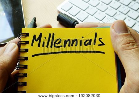 Millennials handwritten in a note. Generation Y concept.