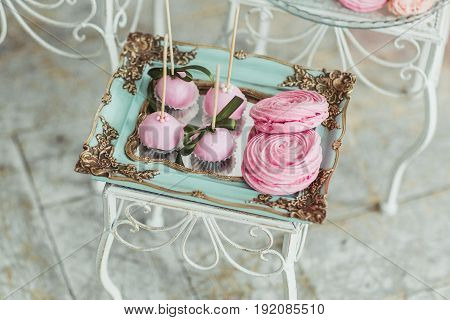 Beautiful multicolored decorated baked sweet tasty candy bar desserts