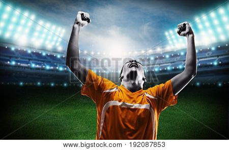 Play victory player soccer enjoying young adult soccer ball